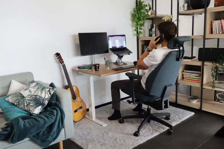 Ergonomic workstation design, electric height-adjustable desk, office chair, Mojo armchair